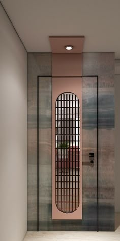 an empty room with a door that has bars on the front and side doors to it