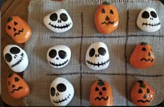 pumpkins and jack - o'- lanterns are arranged in the shape of skulls