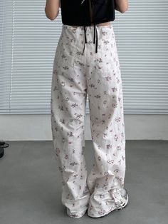 Harajuku Kawaii Aesthetic Y2K Floral White Baggy Cargo Trousers Parachute Pants Size Chart *Standard shipping time to the US is 9-19 business days. Please consult our shipping page for shipping time estimates for other countries. *Please check the measurements/size chart very carefully when ordering from The Kawaii Factory. Most of our clothes come in Asian sizes, which are generally 1-2 sizes smaller than US/EU sizes. Buyers shall bear the full cost of return shipping charges unless the product is significantly different from what is described on the product page. *Lingerie and pajamas cannot be returned or exchanged. White Cargo Parachute Pants, Casual White Parachute Pants For Streetwear, White Full Length Parachute Pants For Summer, Harajuku Style Bottoms With Pockets For Spring, Baggy Harajuku Style Pants For Spring, Baggy White Parachute Pants For Spring, Y2k Style Bottoms For Spring Loungewear, White Casual Parachute Pants For Spring, Casual White Parachute Pants For Spring