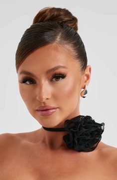 Add a playful. feminine vibe to any look with the Tilli floral neck tie.   Colour: Black. Flower corsage detail. Black Flower Corsage, Homecoming Dresses Corset, Pink Monochrome, Midi Dress Wedding Guest, High Low Prom Dress, Ruffled Gown, Flower Corsage, Maxi Dress Sale, Popular Dresses