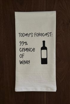 a white towel with a bottle of wine on it that says today's forecast 99 % chance of wine