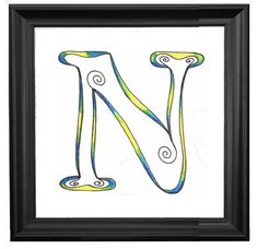 the letter n is painted in bright colors with swirls on it's sides