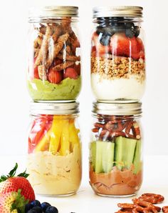 three mason jars filled with healthy granola and go snack jars