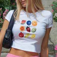 Fruit Salad 90s Baby Tee, T-shirt 90s Aesthetic Vintage Tee Trending Y2K Print Top * 90's Inspired baby tee style (made for adults) * 100% cotton * Easy tear-away label * Y2K Vintage Streetwear Trending Fashion * Environmentally sustainable made-to-order system The '90s-inspired baby features a soft, stretchy fabric, offering a snug, comfortable, and figure-flattering fit. Featuring a vibrant graphic print, this baby tee embodies the playful and youthful style of the 90's and Y2K eras. Ideal for 90s Style Printed T-shirt For Spring, 90s Inspired Summer T-shirt With Letter Print, 90s Style Printed T-shirt For Streetwear, Y2k Printed Streetwear Tops, Y2k Printed Tops For Streetwear, Y2k Style Short Sleeve T-shirt With Fruit Print, Y2k Style Printed Tops For Summer, Y2k Printed Crew Neck T-shirt, Fitted Y2k T-shirt For Summer