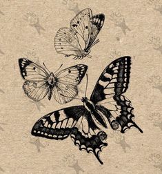 three butterflies flying in the air on top of a piece of paper with black and white ink