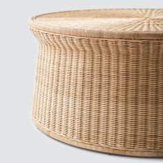 an empty wicker basket with lid on a white background for product display or presentation