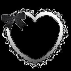 a black and white heart frame with a bow on the top, in front of a black background