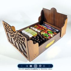 a wooden box filled with lots of different items