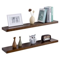 two wooden shelves with decorative items on them