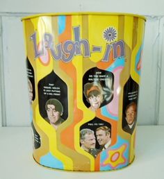 a yellow trash can with the words laugh - n on it's side and images of men in different colors