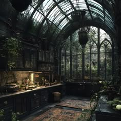 an old fashioned kitchen with lots of plants in the window sill and glass walls