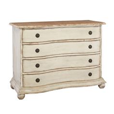 a white dresser with three drawers and two knobs on the front, against a white background