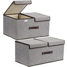 two grey storage boxes with brown handles