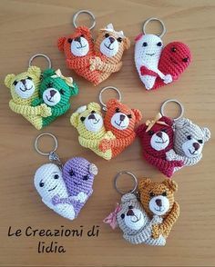 crocheted keychains with teddy bears in different colors and sizes on them