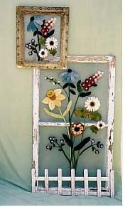 an old window frame with flowers on it