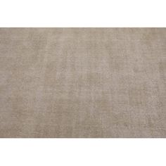 an area rug with a light brown color on the top and bottom, it is very soft