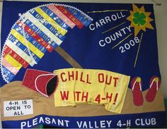 a bulletin board is decorated with colorful flags and flip flops on the beach, which reads chill out with 4 - 4 - 4 - h