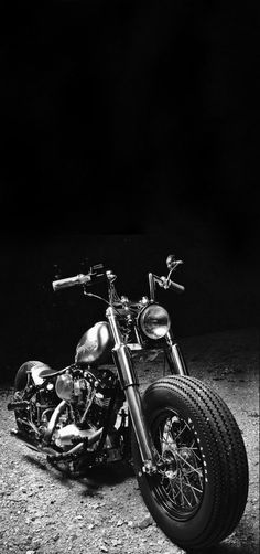 a black and white photo of a motorcycle