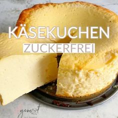 a cheesecake on a plate with the words kasekuchen zuckerrei