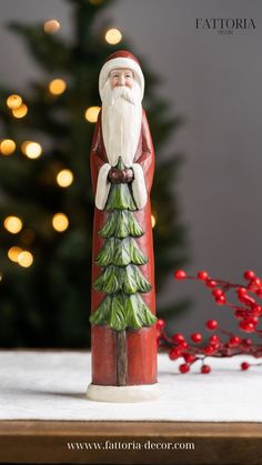 Beautiful Santa Figurine. The realistic painted finish paired with the traditional red, white, and green color scheme and pine tree accent Lime Powder, Green Color Scheme, Santa Carving, Simple Wood Carving, Santa Patterns, Green Color Schemes, Santa Figurines, Tree Carving, Christmas Decorations Living Room