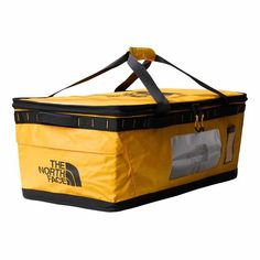 the north face yellow and black insulated cooler bag with straps on it's side