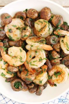 shrimp and mushroom recipe in a white bowl