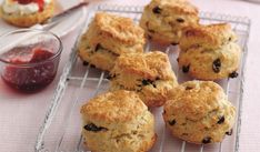 several biscuits on a cooling rack with forks