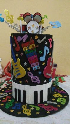 a birthday cake decorated with musical instruments and music notes