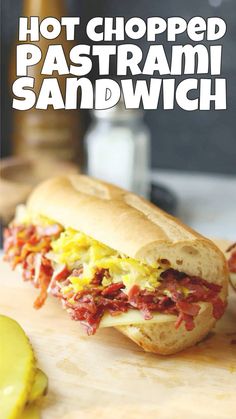 hot chopped pasta sandwich sitting on top of a cutting board