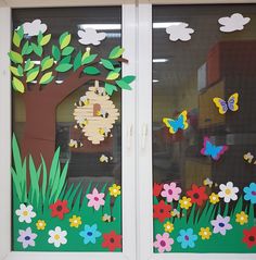 the window is decorated with flowers and butterflies