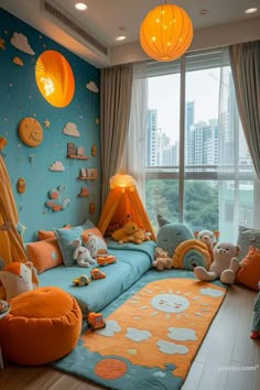 a child's bedroom decorated in blue and orange