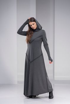 "Plus Size Maxi Dress, Gothic Hoodie Dress, Women Winter Dress ♠ This sleek maxi length dress will easily become your favorite for the season! Featuring a shawl hood, extra long sleeves with thumb-hole cuffs and an asymmetric hem, this piece feels unique, yet minimalist. The soft cotton blend material hugs the body and compliments it at all the right places. ♠ Sizes The model on the picture is wearing size S. Have a look at my Size Chart below to make sure your piece will fit you best. ** PLEASE Winter Long Sleeve Cotton Maxi Dress, Winter Cotton Maxi Dress With Long Sleeves, Cotton Long Sleeve Maxi Dress For Winter, Fitted Gray Maxi Dress For Winter, Boho Winter Dress, Boho Dress Winter, Long Hoodie Dress, Long Sweatshirt Dress, Modest Dresses For Women