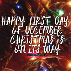 a christmas card with the words happy first day of december on it's way