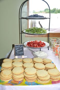 an assortment of food is displayed on a table