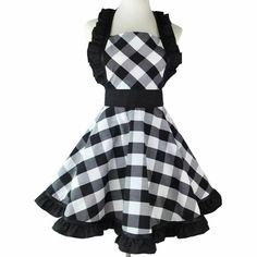 a black and white checkered dress on a mannequin