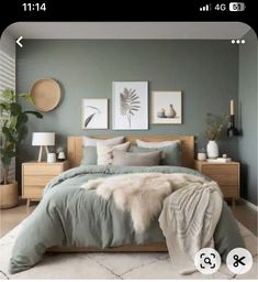 a bed room with a neatly made bed and two pictures on the wall above it