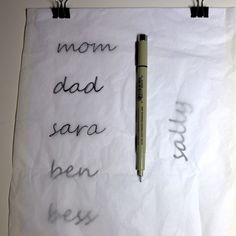 a piece of paper with writing on it that says mom, dad, and son