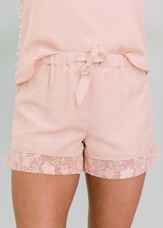 The Purchase of the Katelyn Pajama Short Includes: DONATION to United States based non-profit benefiting women Product Details: Luxe pajama short featuring floral and butterfly embroidered cuff. Model wearing size Small Available in Sizes XS-1X Fabric Content: 100% Polyester Crepe Short lined in the same pink fabric as outer fabric Floral and butterfly embroidered mesh cuff - 2.25 inches Faux pocket Drawstring tie with elastic band for accommodating fit Review size chart for fit details related Short Sleepwear For Spring Sleepover, Spring Pajama Party Shorts, Feminine Spring Pajama Shorts For Sleep, Spring Lace Trim Pajama Shorts, Lace Trim Pajama Shorts For Spring, Feminine Spring Pajama Shorts For Loungewear, Spring Pajama Shorts For Loungewear, Spring Loungewear Pajama Shorts, Chic Spring Pajama Shorts For Loungewear