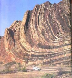 a large rock formation in the middle of nowhere