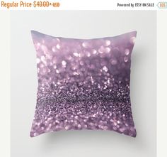 a pillow with purple glitter on it