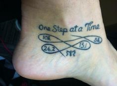 a person has a tattoo on their foot that says one stop at a time for 3 15 m