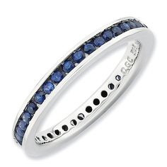 a white gold ring with blue sapphires and black diamonds on the inside, set in 18k white gold