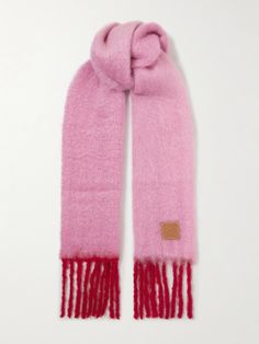 Loewe's scarf is the ideal antidote to wintry days - it's knitted from mohair-blend with plenty of wool in the mix for a warm and fluffy feel. It's detailed with a leather patch bearing the label's heritage 'Anagram' logo and is long enough to wrap around your neck twice. Loewe Scarf, Scarf Inspiration, Fluffy Scarf, Dream Wishlist, Dr Closet, Mohair Scarf, Scarf Outfit, Reversible Scarf, Pink Scarf