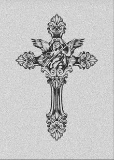 an ornate cross with a bird on it