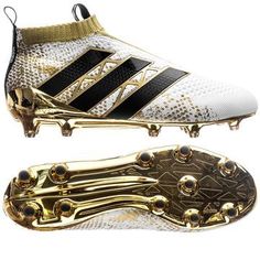 a soccer shoe with gold and black accents