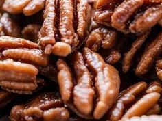 closeup of pecans with brown and white flecks