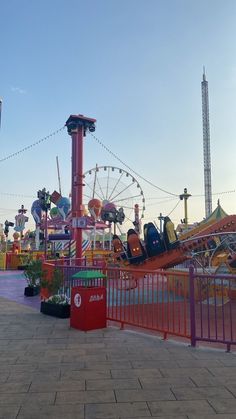 an amusement park with many rides and carnival rides