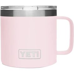 a pink yeti mug with the word yeti on it and a stainless steel lid