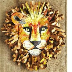 a paper mache of a lion's head