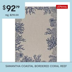 a blue and white rug with corals on it for $ 22 99 reg $ 29 00